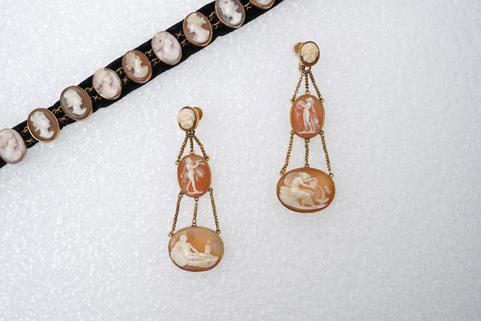 A pair of shell cameo earrings and bracelet, 19th century
